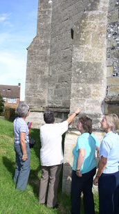 Course participants inspecting a church buttress.